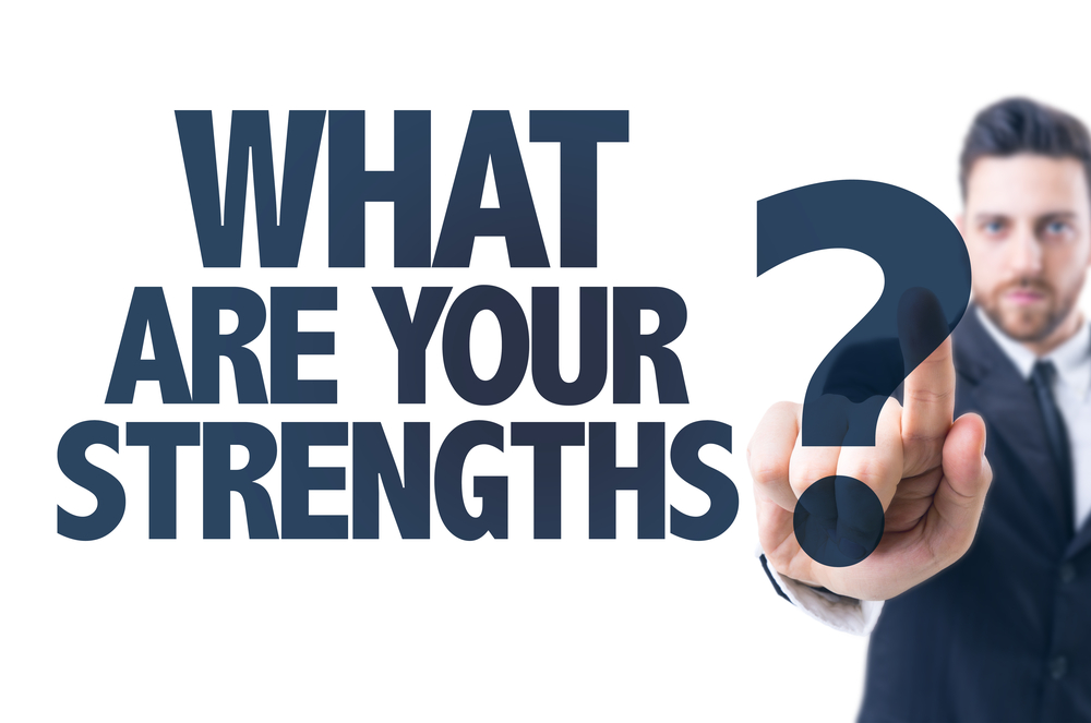 Business man pointing the text What Are Your Strengths?